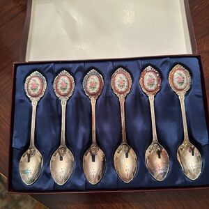 Collectible tea spoons with ceramic detail